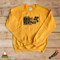 Golden yellow jumper celebrating Urdd Gwent 2027 – Bro’r Wenynen design.